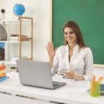 All things education teacher at computer.